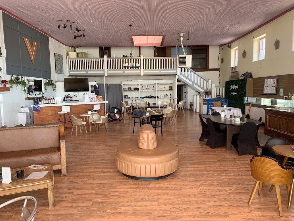 The open interior of the Willcox Commercial building, shared by Soaring Wines, Copper Horse Vineyard and Strive Vineyards